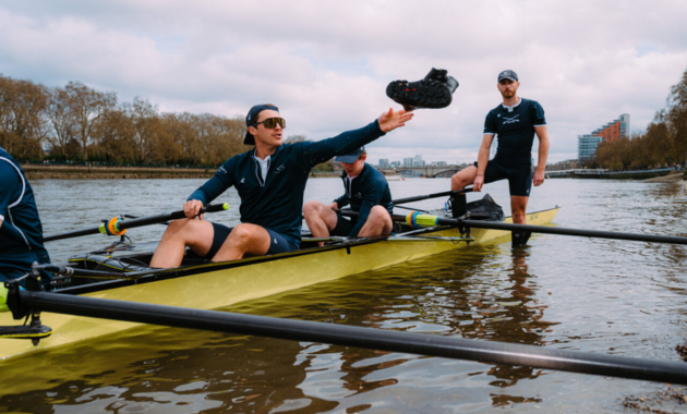 The Boat Race person in boat throwing welly - Dig & Dig