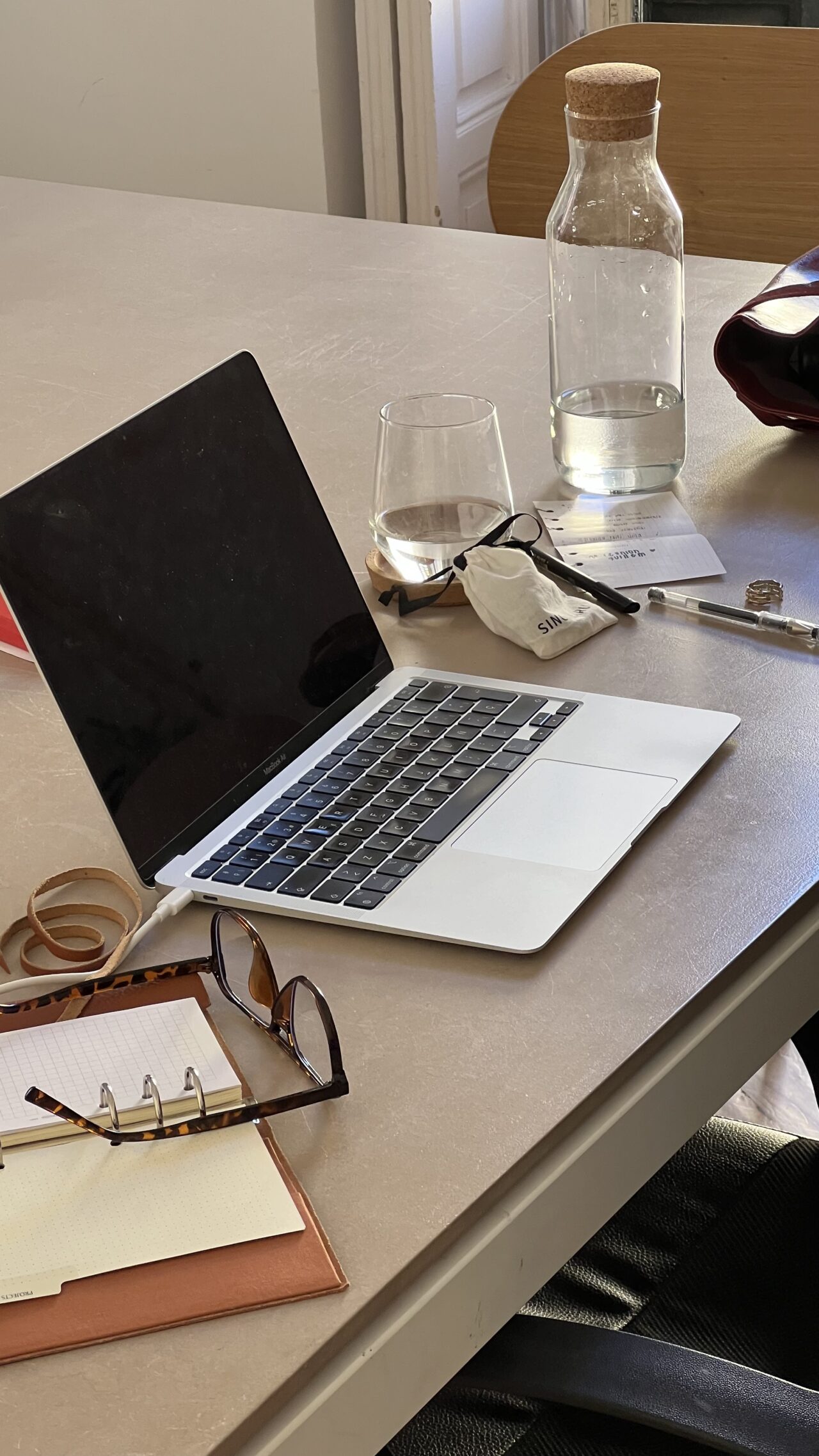 laptop on desk calculating b2b paid media strategy - Dig & Dig