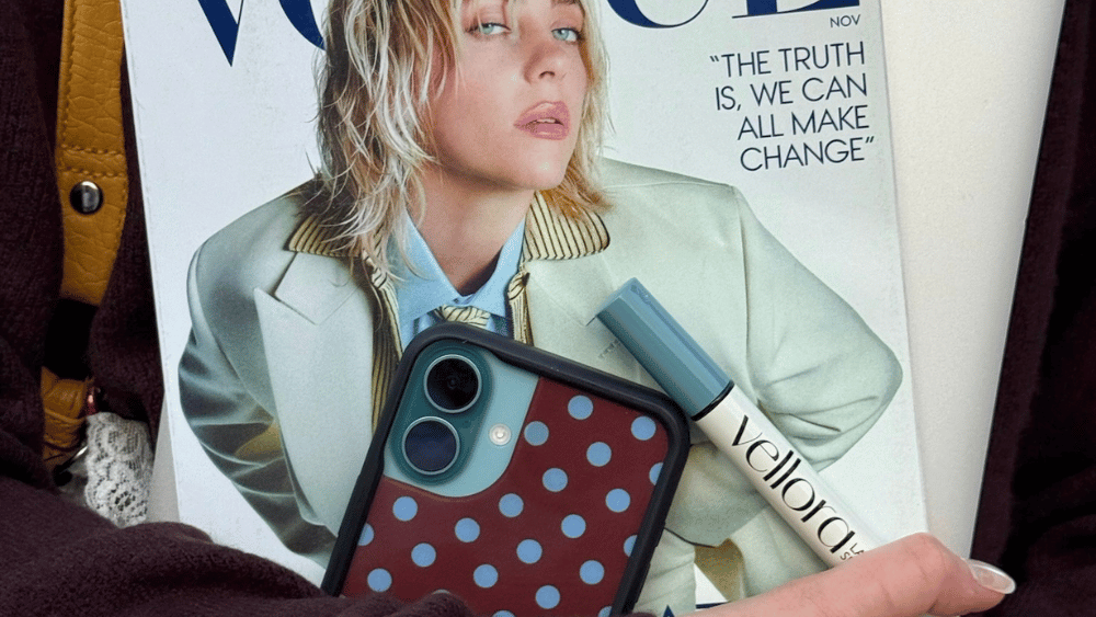 Gen Z holding Vogue Magazine with Billie Eilish on the front, lipgloss, and an iPhone - Dig & Dig