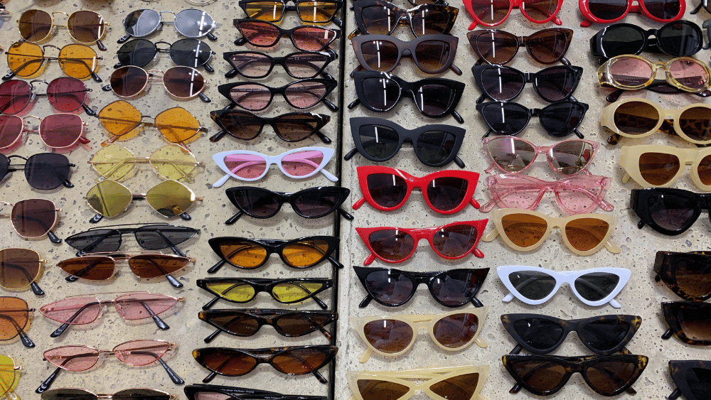 Shop display with rows of sunglasses - Dig & Dig