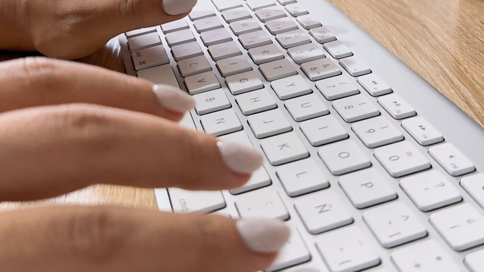 Person typing on keyboard AI PPC strategy - Dig & Dig